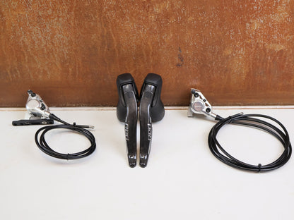 Brems-/ Schalthebel von Sram, SRAM RED AXS E1 SCHALT-BREMSHEBEL + HYDR. SCHEIBENBREMSE SET vor USEDBIKES-OB.DE Hintergrund