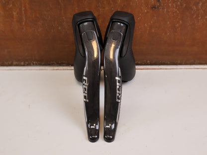 Brems-/ Schalthebel von Sram, SRAM RED AXS E1 SCHALT-BREMSHEBEL + HYDR. SCHEIBENBREMSE SET vor USEDBIKES-OB.DE Hintergrund