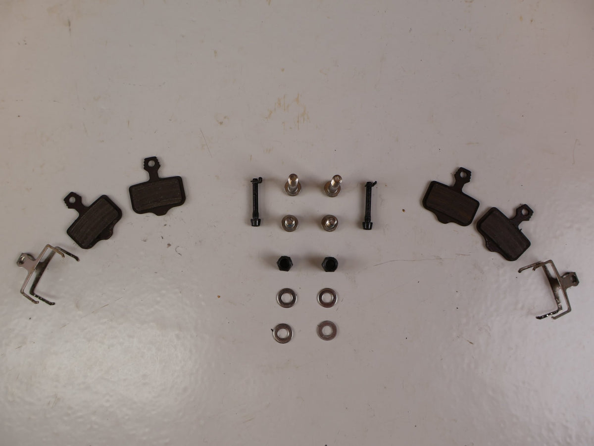 Brems-/ Schalthebel von Sram, SRAM RED AXS E1 Schalt Bremshebel Set Flatmount vor USEDBIKES-OB.DE Hintergrund