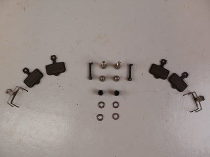 Brems-/ Schalthebel von Sram, SRAM RED AXS E1 Schalt Bremshebel Set Flatmount vor USEDBIKES-OB.DE Hintergrund