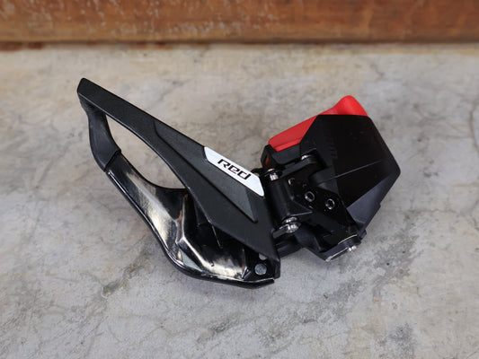 Schaltungsteile von Sram, SRAM RED AXS E1 UMWERFER / 2×12 ROAD – WIRELESS – BRAZE - ON vor USEDBIKES - OB.DE Hintergrund