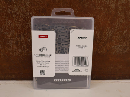 Kette von Sram, SRAM RED E1 KETTE FLATTOP 12 / 13 FACH SILBER 126 GL vor USEDBIKES-OB.DE Hintergrund
