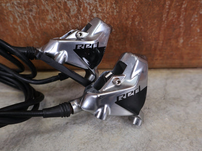 Brems - / Schalthebel von Sram, SRAM RED ETAP AXS BREMS - / SCHALTHEBEL DISC / TEAM EDITION - RACE / SET vor USEDBIKES - OB.DE Hintergrund