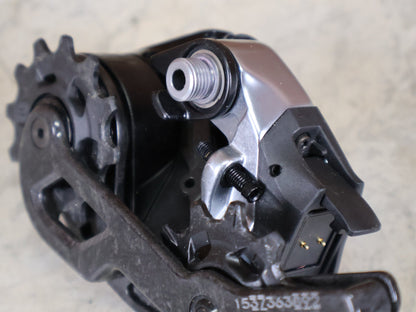 Schaltungsteile von Sram, SRAM RED ETAP AXS D1 SCHALTWERK 12 - FACH – KURZ – 33T / ROAD vor USEDBIKES - OB.DE Hintergrund