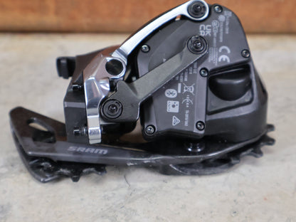 Schaltungsteile von Sram, SRAM RED ETAP AXS D1 SCHALTWERK 12 - FACH – KURZ – 33T / ROAD vor USEDBIKES - OB.DE Hintergrund