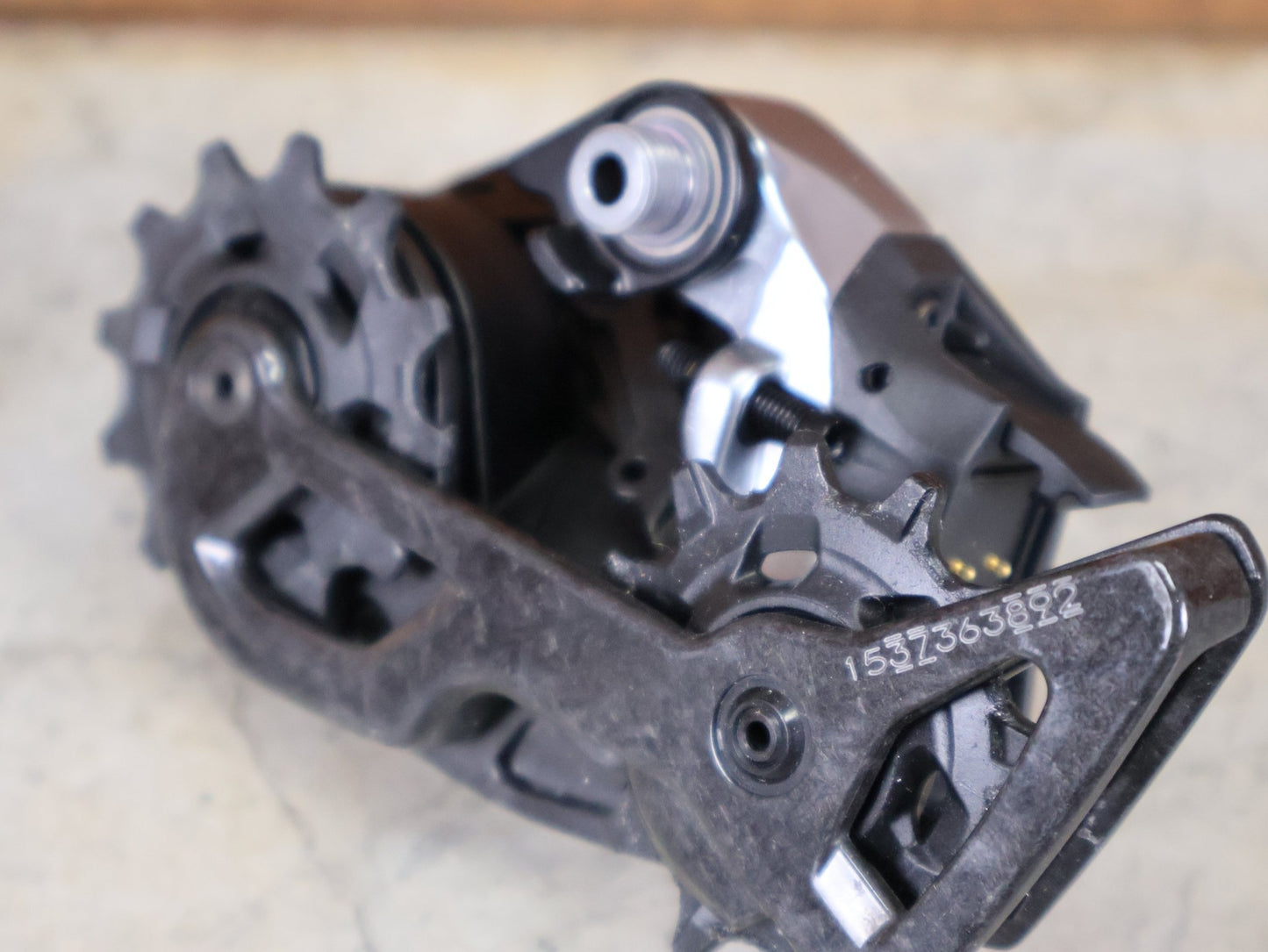 Schaltungsteile von Sram, SRAM RED ETAP AXS D1 SCHALTWERK 12 - FACH – KURZ – 33T / ROAD vor USEDBIKES - OB.DE Hintergrund