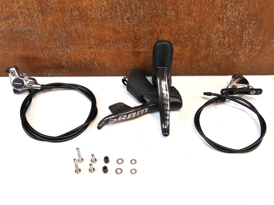 Brems-/ Schalthebel von Sram, SRAM RED ETAP AXS D1 SHIFTER DISCBRAKE SET / TEAM EDITION vor USEDBIKES-OB.DE Hintergrund