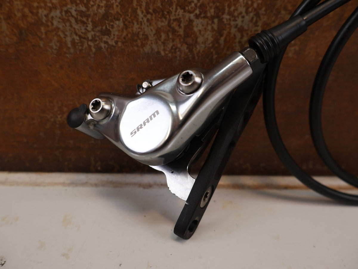 Brems-/ Schalthebel von Sram, SRAM RED ETAP AXS D1 TEAM EDITION SCHALT BREMSHEBEL SET FLATMOUNT vor USEDBIKES-OB.DE Hintergrund