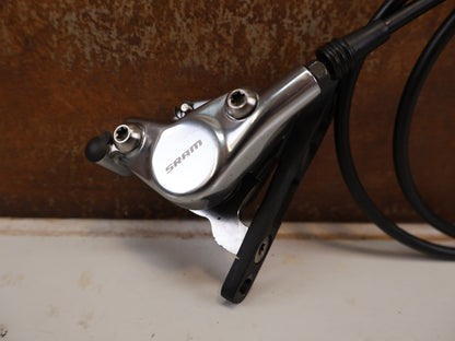 Brems-/ Schalthebel von Sram, SRAM RED ETAP AXS D1 TEAM EDITION SCHALT BREMSHEBEL SET FLATMOUNT vor USEDBIKES-OB.DE Hintergrund