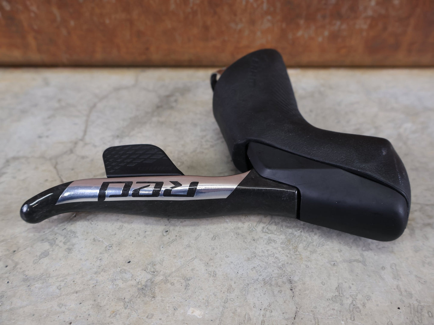 Brems - / Schalthebel von Sram, SRAM RED ETAP AXS / SCHALT - BREMSHEBEL - SET / 12 - FACH / CARBON / DISC vor USEDBIKES - OB.DE Hintergrund