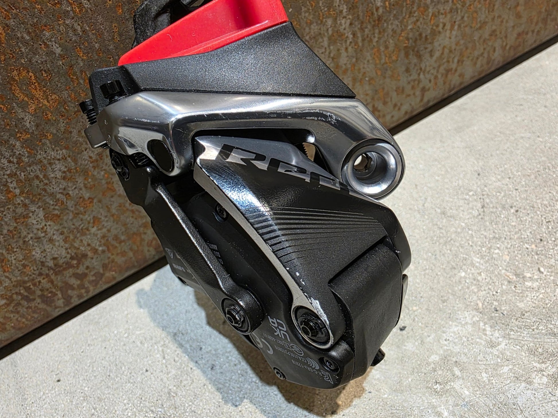 Schaltungsteile von Sram, SRAM RED ETAP AXS SCHALTWERK 12 FACH D1 / 33T vor USEDBIKES - OB.DE Hintergrund