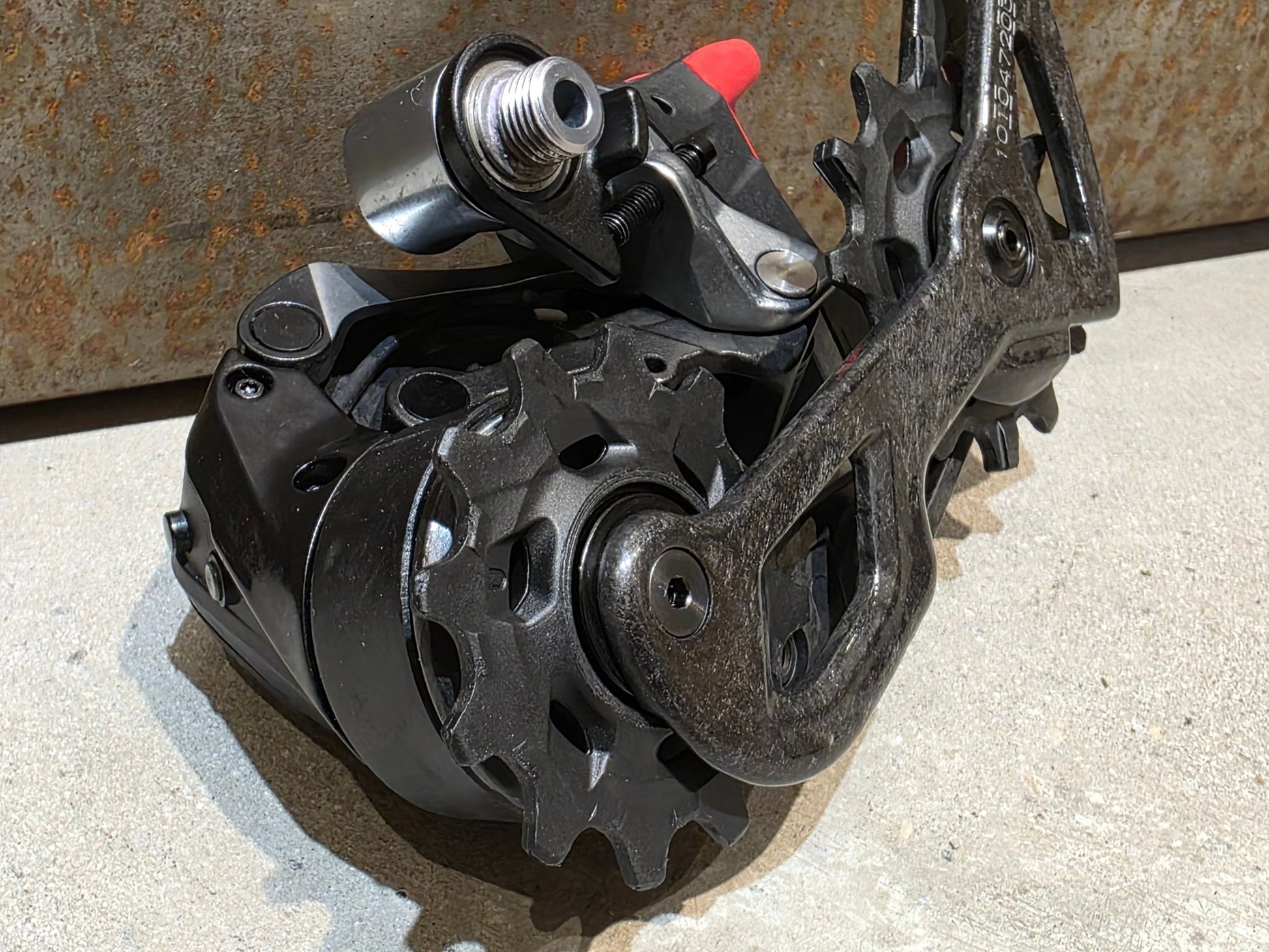 Schaltungsteile von Sram, SRAM RED ETAP AXS SCHALTWERK 12 FACH D1 / 33T vor USEDBIKES - OB.DE Hintergrund