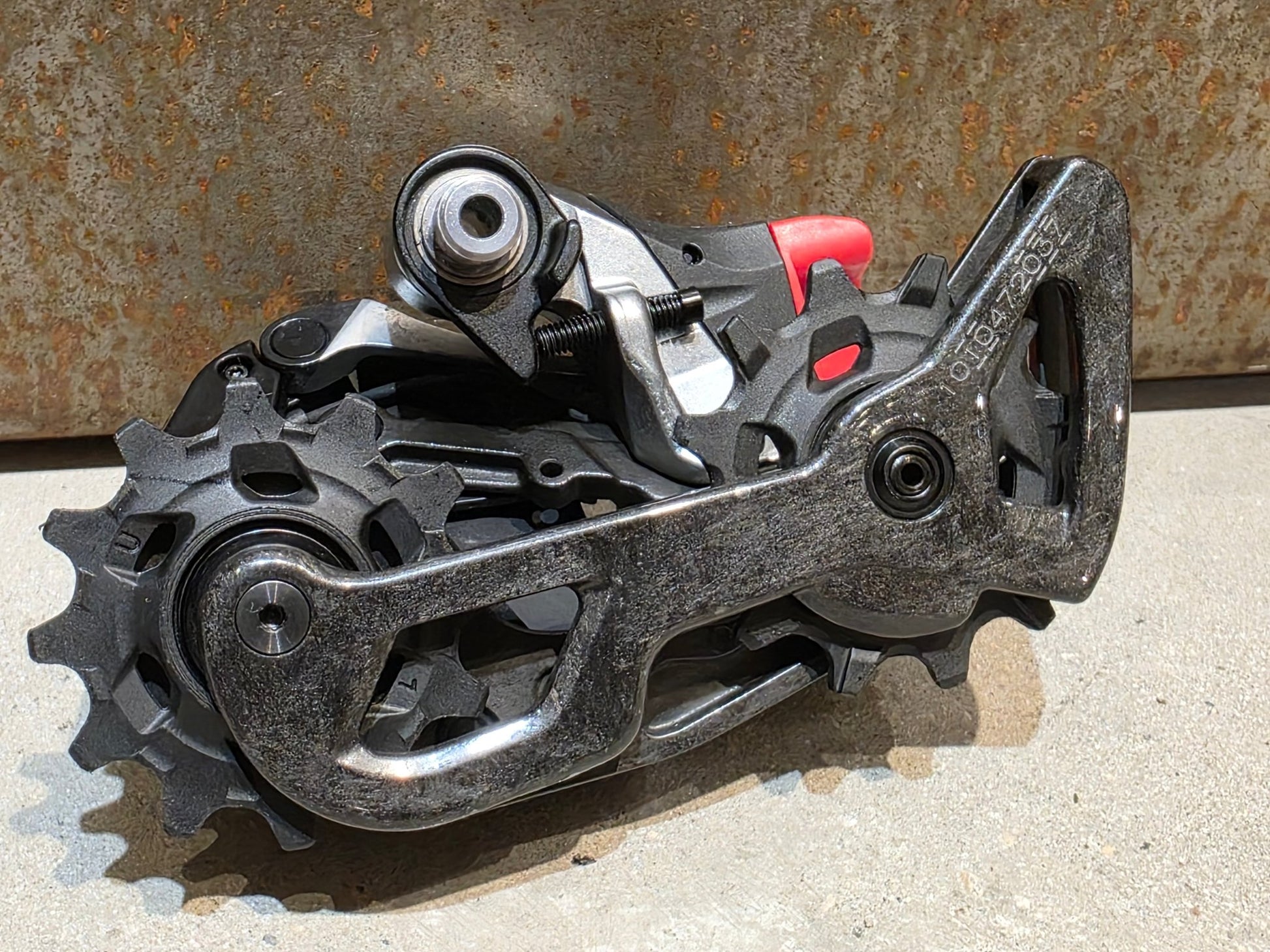 Schaltungsteile von Sram, SRAM RED ETAP AXS SCHALTWERK 12 FACH D1 / 33T vor USEDBIKES - OB.DE Hintergrund