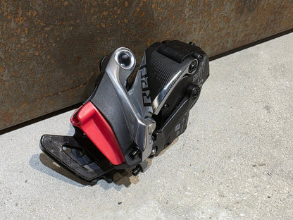Schaltungsteile von Sram, SRAM RED ETAP AXS SCHALTWERK 12 FACH D1 / 33T vor USEDBIKES - OB.DE Hintergrund