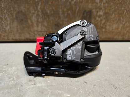 Schaltungsteile von Sram, SRAM RED ETAP AXS XPLR SCHALTWERK 12 FACH vor USEDBIKES - OB.DE Hintergrund