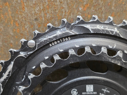 Kettenblatt von Sram, SRAM RED QUARQ AXS POWERMETER KIT 8 - BOLT SPIDER 2X12 46/33 ZÄHNE / BASTLERWARE vor USEDBIKES - OB.DE Hintergrund