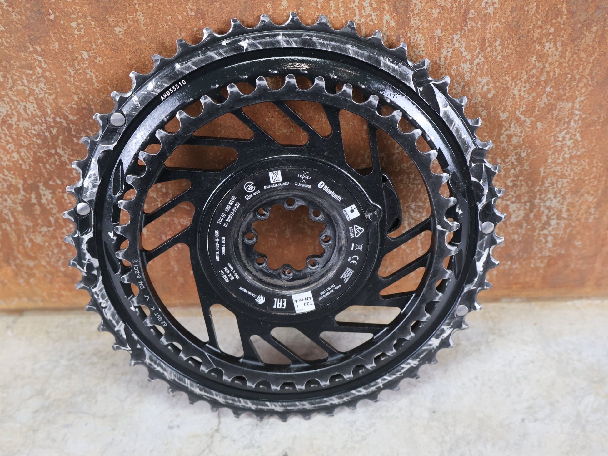 Kettenblatt von Sram, SRAM RED QUARQ AXS POWERMETER KIT 8 - BOLT SPIDER 2X12 52/39 ZÄHNE / BASTLERWARE vor USEDBIKES - OB.DE Hintergrund