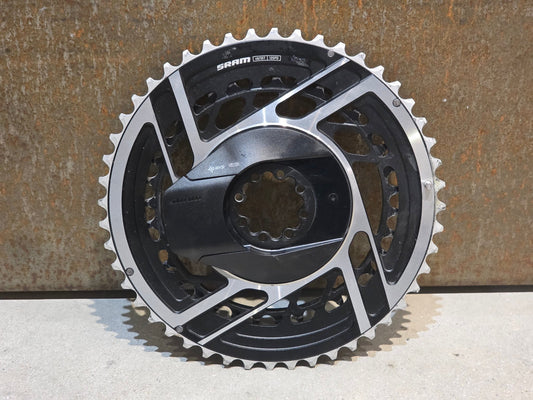 Kettenblatt von Sram, SRAM RED QUARQ AXS POWERMETER KIT E1 8 - BOLT SPIDER 2X12 48/35 ZÄHNE vor USEDBIKES - OB.DE Hintergrund