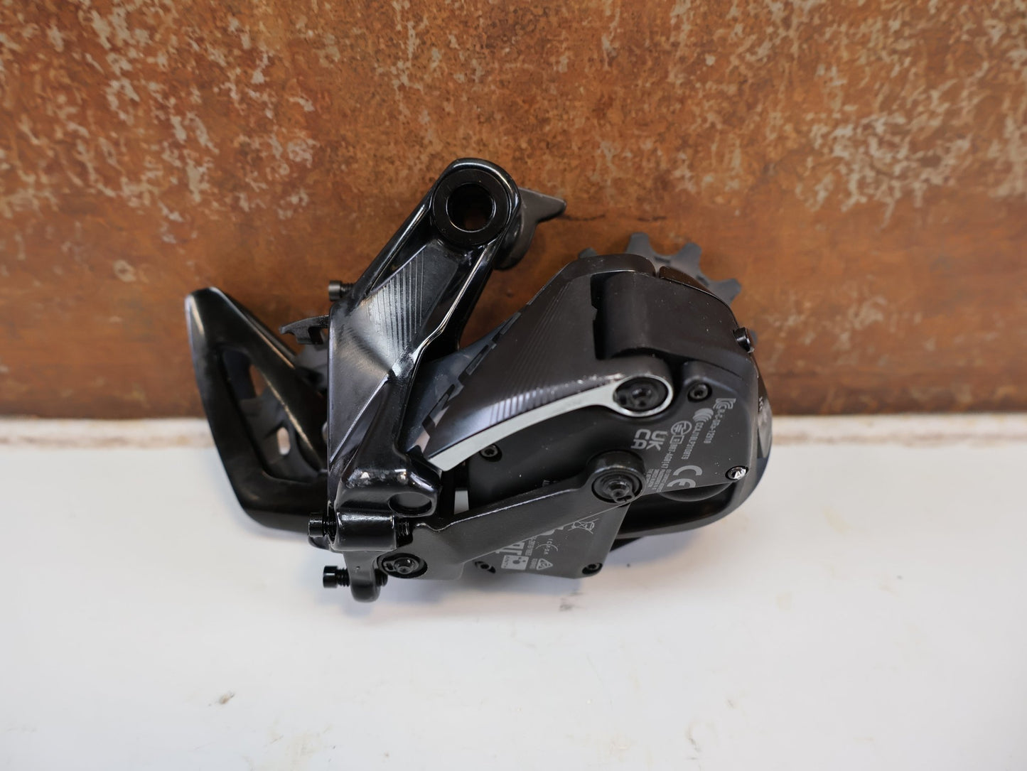 Schaltungsteile von Sram, SRAM RED XPLR ETAP AXS SCHALTWERK / 12-FACH / 10-44T / KERAMIKLAGER vor USEDBIKES-OB.DE Hintergrund
