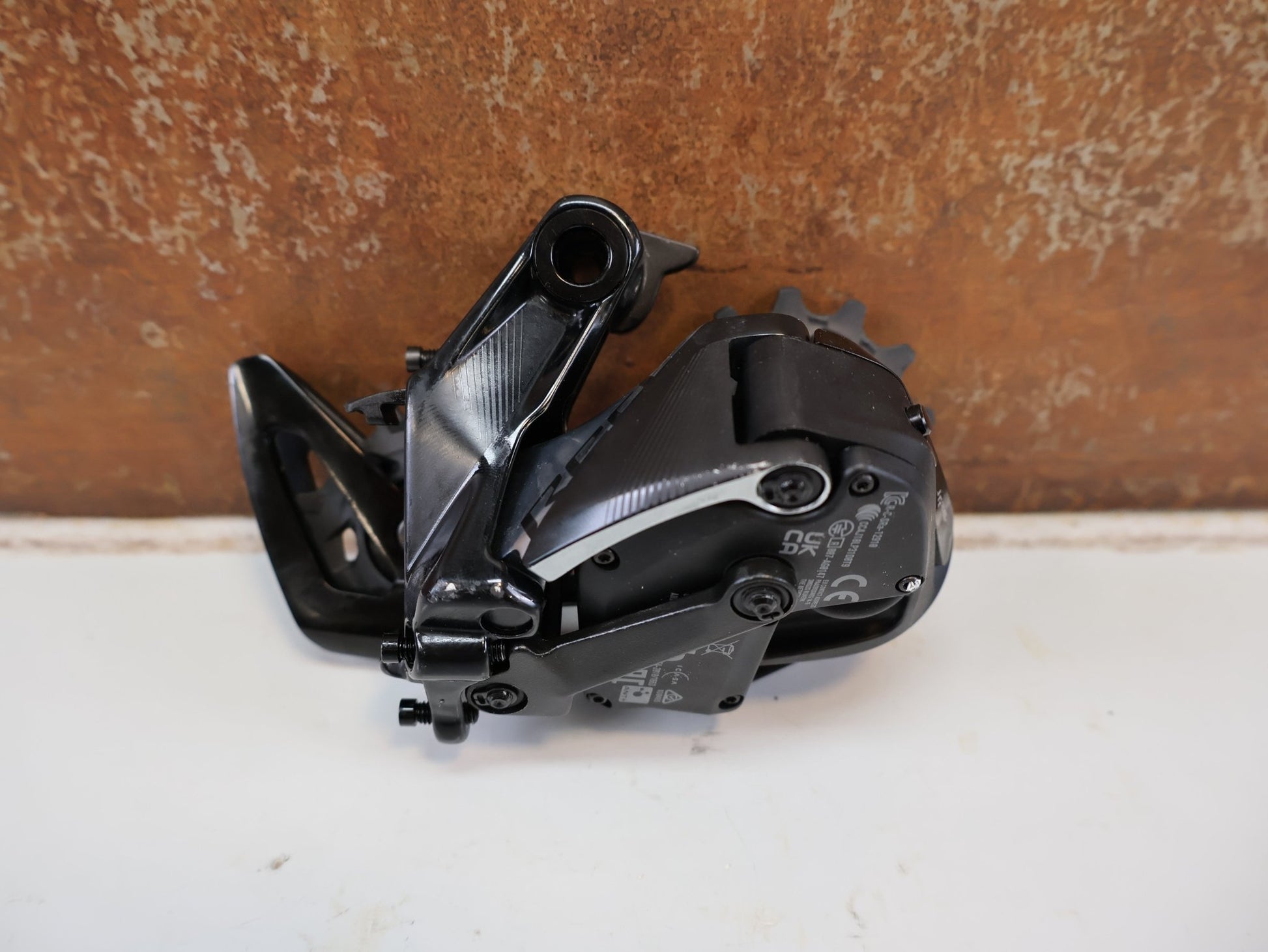 Schaltungsteile von Sram, SRAM RED XPLR ETAP AXS SCHALTWERK / 12-FACH / 10-44T / KERAMIKLAGER vor USEDBIKES-OB.DE Hintergrund