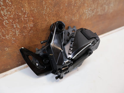 Schaltungsteile von Sram, SRAM RED XPLR ETAP AXS SCHALTWERK / 12-FACH / 10-44T / KERAMIKLAGER vor USEDBIKES-OB.DE Hintergrund