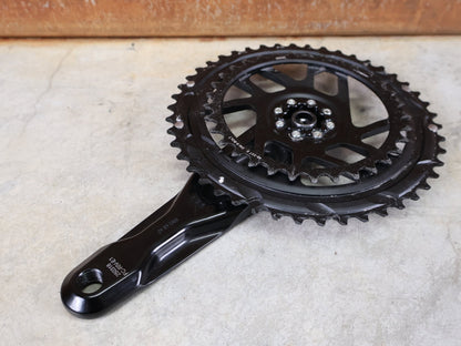 Kurbel von Sram, SRAM RIVAL DUB ROAD KURBEL E1 / 2X12 - FACH / 48 - 35 ZÄHNE / 175 MM / 789G vor USEDBIKES - OB.DE Hintergrund