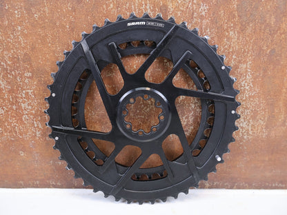 Kettenblatt von Sram, SRAM Rival E1 Kettenblattsatz 48-35T 8-Bolt 2x12 204g vor USEDBIKES-OB.DE Hintergrund