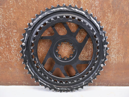 Kettenblatt von Sram, SRAM Rival E1 Kettenblattsatz 48-35T 8-Bolt 2x12 204g vor USEDBIKES-OB.DE Hintergrund