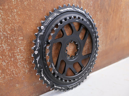 Kettenblatt von Sram, SRAM Rival E1 Kettenblattsatz 48-35T 8-Bolt 2x12 204g vor USEDBIKES-OB.DE Hintergrund
