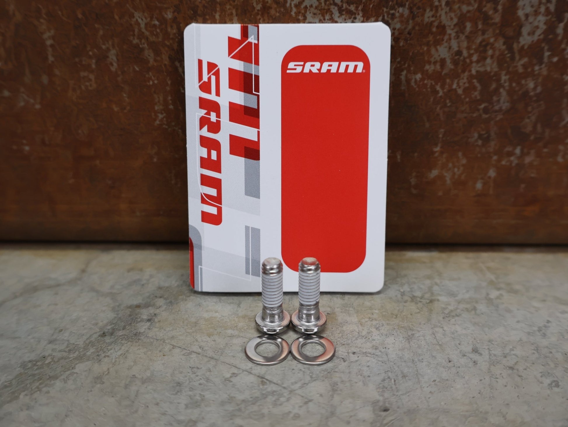 Zubehör von Sram, SRAM TITAN BREMSATTEL SCHRAUBEN - SET 17 MM – TITAN BEFESTIGUNGSSCHRAUBEN FÜR SCHEIBENBREMSEN vor USEDBIKES - OB.DE Hintergrund