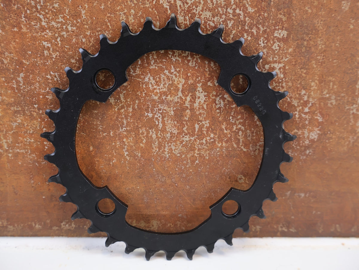 Kettenblatt von Sram, SRAM X-SYNC 2 EAGLE KETTENBLATT 34T 104 MM BCD vor USEDBIKES-OB.DE Hintergrund
