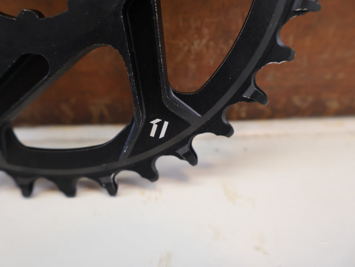 Kettenblatt von Sram, SRAM X SYNC 2 KETTENBLATT 6 MM OFFSET 34T / 36T / 3 BOLT vor USEDBIKES-OB.DE Hintergrund