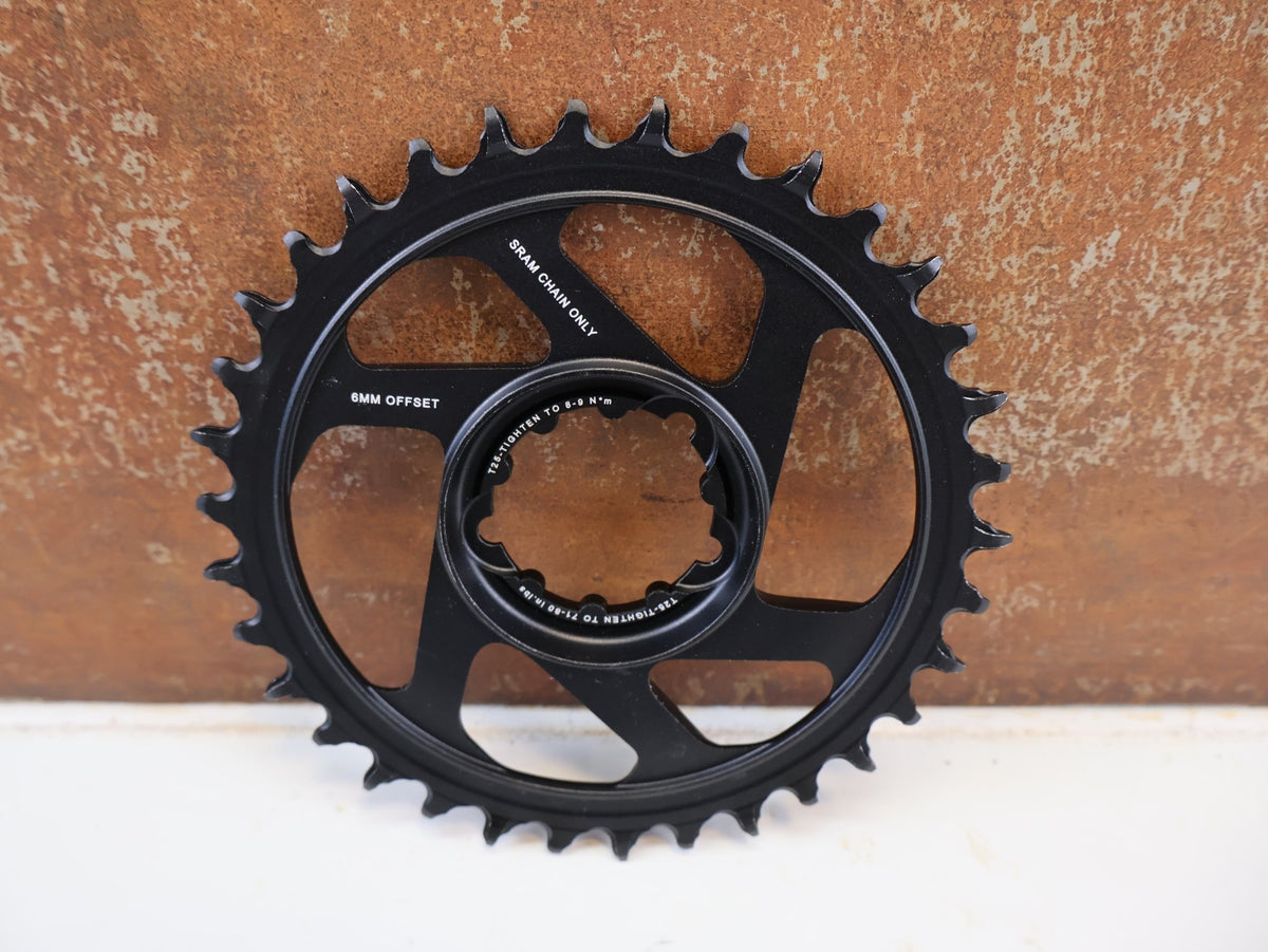 Kettenblatt von Sram, SRAM X SYNC 2 KETTENBLATT 6 MM OFFSET 34T / 36T / 3 BOLT vor USEDBIKES-OB.DE Hintergrund