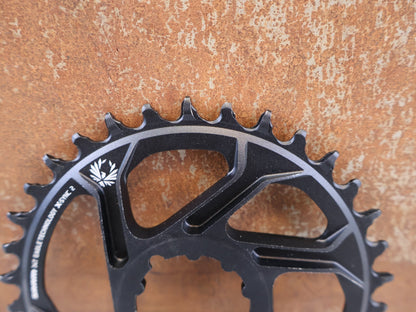 Kettenblatt von Sram, SRAM X SYNC 2 KETTENBLATT 6 MM OFFSET 34T / 36T / 3 BOLT vor USEDBIKES-OB.DE Hintergrund