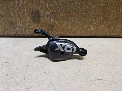 Schaltungsteile von Sram, SRAM X01 EAGLE TRIGGER SCHALTHEBEL 12 FACH vor USEDBIKES - OB.DE Hintergrund