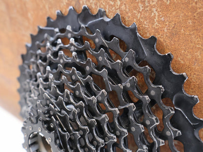 Kassette & Zahnkränze von Sram, SRAM XG-1175 KASSETTE / 11-FACH MTB KASSETTE / XD-FREILAUF / 10-42 Z vor USEDBIKES-OB.DE Hintergrund