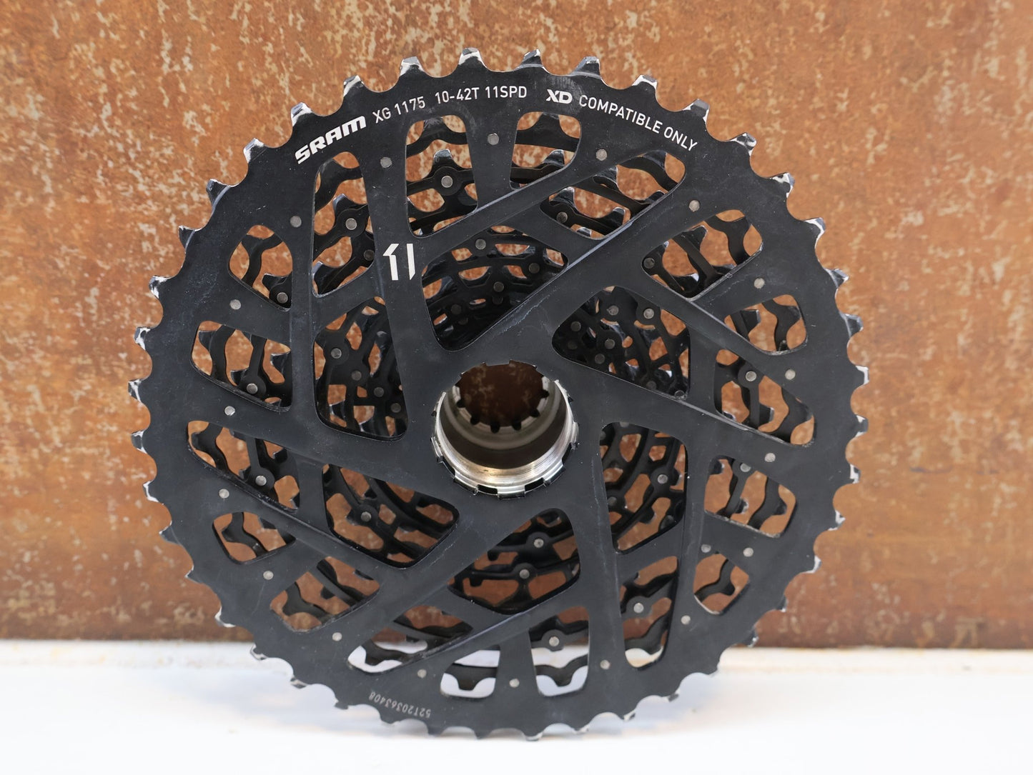 Kassette & Zahnkränze von Sram, SRAM XG-1175 KASSETTE / 11-FACH MTB KASSETTE / XD-FREILAUF / 10-42 Z vor USEDBIKES-OB.DE Hintergrund