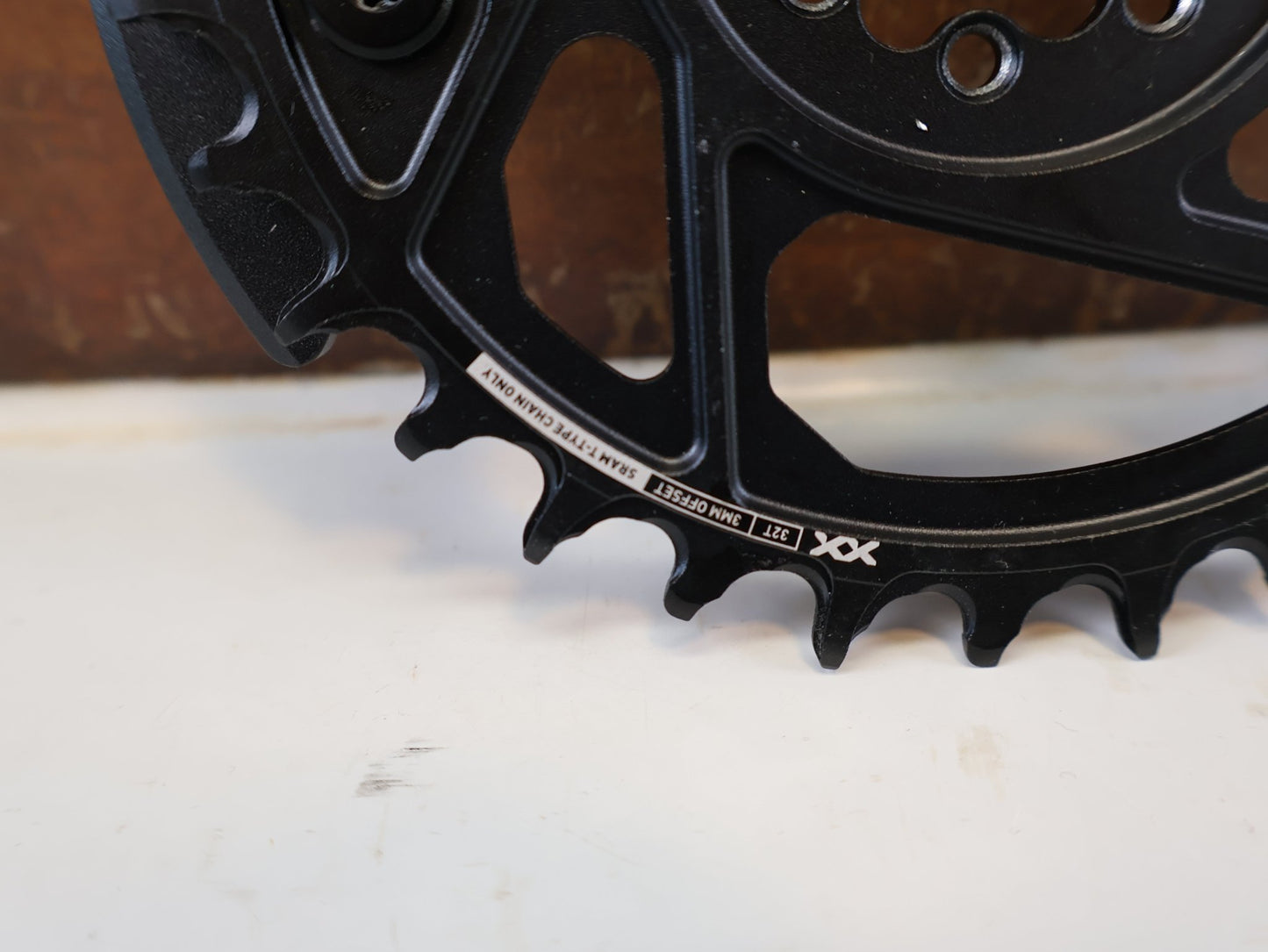 Kettenblatt von Sram, SRAM XX EAGLE TRANSMISSION KETTENBLATT / 32Z / 3MM OFFSET / INKL. BASHGUARDS vor USEDBIKES-OB.DE Hintergrund