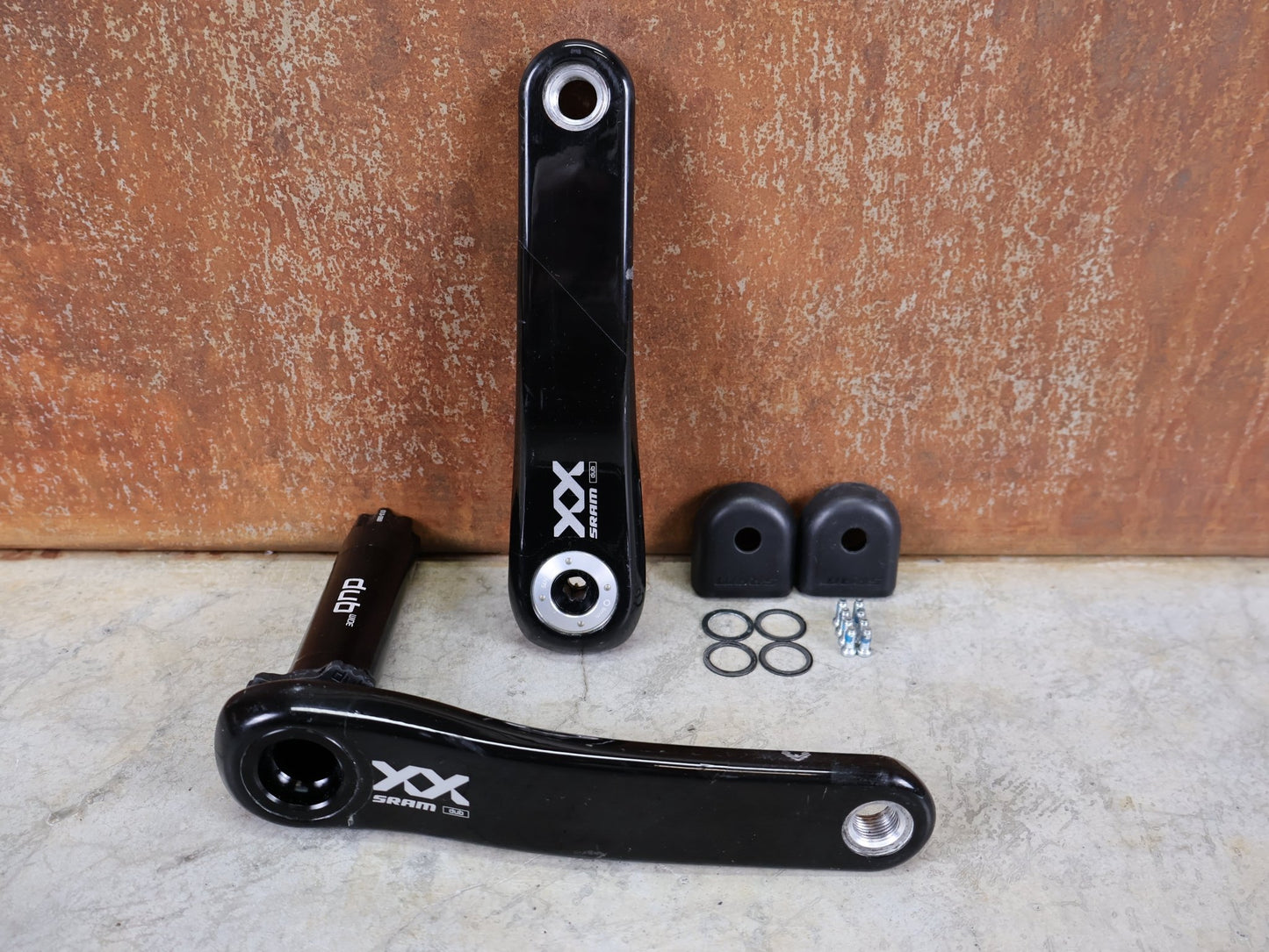 Kurbel von Sram, SRAM XX EAGLE TRANSMISSION KURBELARME – DUB MTB WIDE / 55 MM – 165 MM vor USEDBIKES - OB.DE Hintergrund