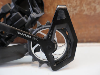 Schaltungsteile von Sram, SRAM XX SL EAGLE AXS T-TYPE SCHALTWERK / 12-FACH TRANSMISSION CARBON MTB vor USEDBIKES-OB.DE Hintergrund