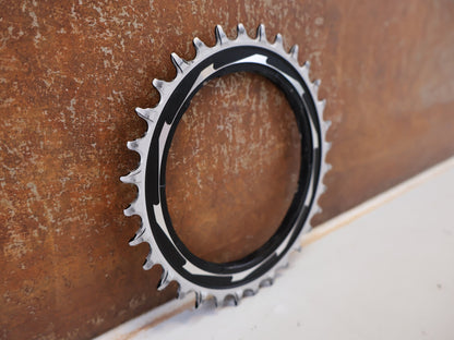 Kettenblatt von Sram, SRAM XX SL EAGLE T TYPE KETTENBLATT 32Z THREAD MOUNT / 0MM OFFSET vor USEDBIKES-OB.DE Hintergrund