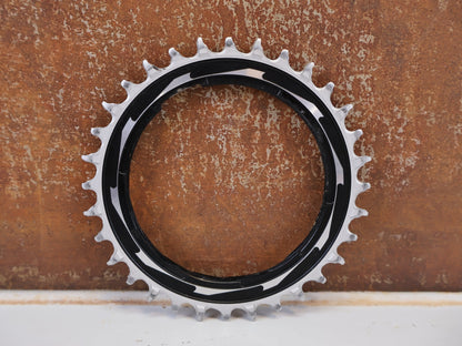Kettenblatt von Sram, SRAM XX SL EAGLE T TYPE KETTENBLATT 32Z THREAD MOUNT / 0MM OFFSET vor USEDBIKES-OB.DE Hintergrund