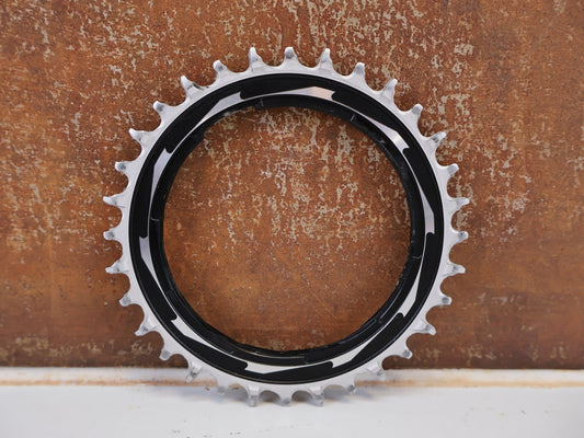 Kettenblatt von Sram, SRAM XX SL EAGLE T TYPE KETTENBLATT 32Z THREAD MOUNT / 0MM OFFSET vor USEDBIKES-OB.DE Hintergrund