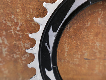 Kettenblatt von Sram, SRAM XX SL EAGLE TRANSMISSION KETTENBLATT / 34 ZÄHNE / 0 MM OFFSET / THREAD MOUNT vor USEDBIKES - OB.DE Hintergrund