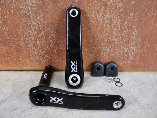 Kurbel von Sram, SRAM XX SL EAGLE TRANSMISSION KURBELARME – DUB MTB WIDE / 55 MM – 165 MM vor USEDBIKES - OB.DE Hintergrund