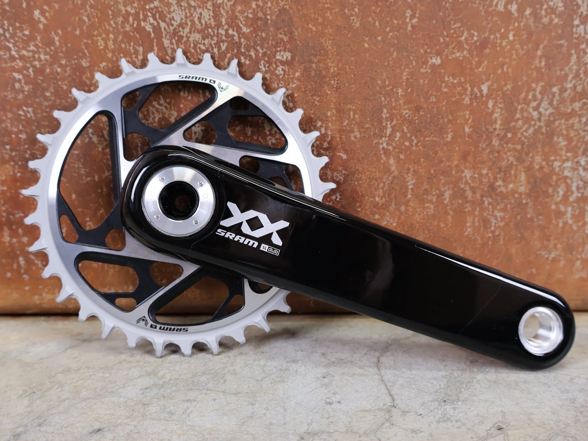 Kurbel von Sram, SRAM XX SL EAGLE TRANSMISSION KURBELGARNITUR – DUB MTB WIDE / 55 MM – 165 MM – 34 Z vor USEDBIKES - OB.DE Hintergrund