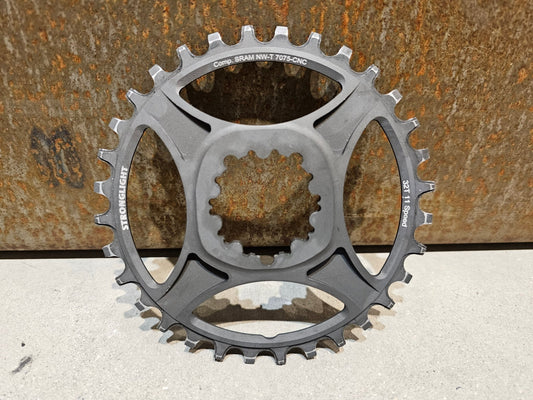 Kettenblatt von Stronglight, STRONGLIGHT SRAM DIRECTMOUNT KETTENBLATT 11 FACH 6MM OFFSET 32 ZÄHNE in variant_title vor USEDBIKES - OB.DE Hintergrund