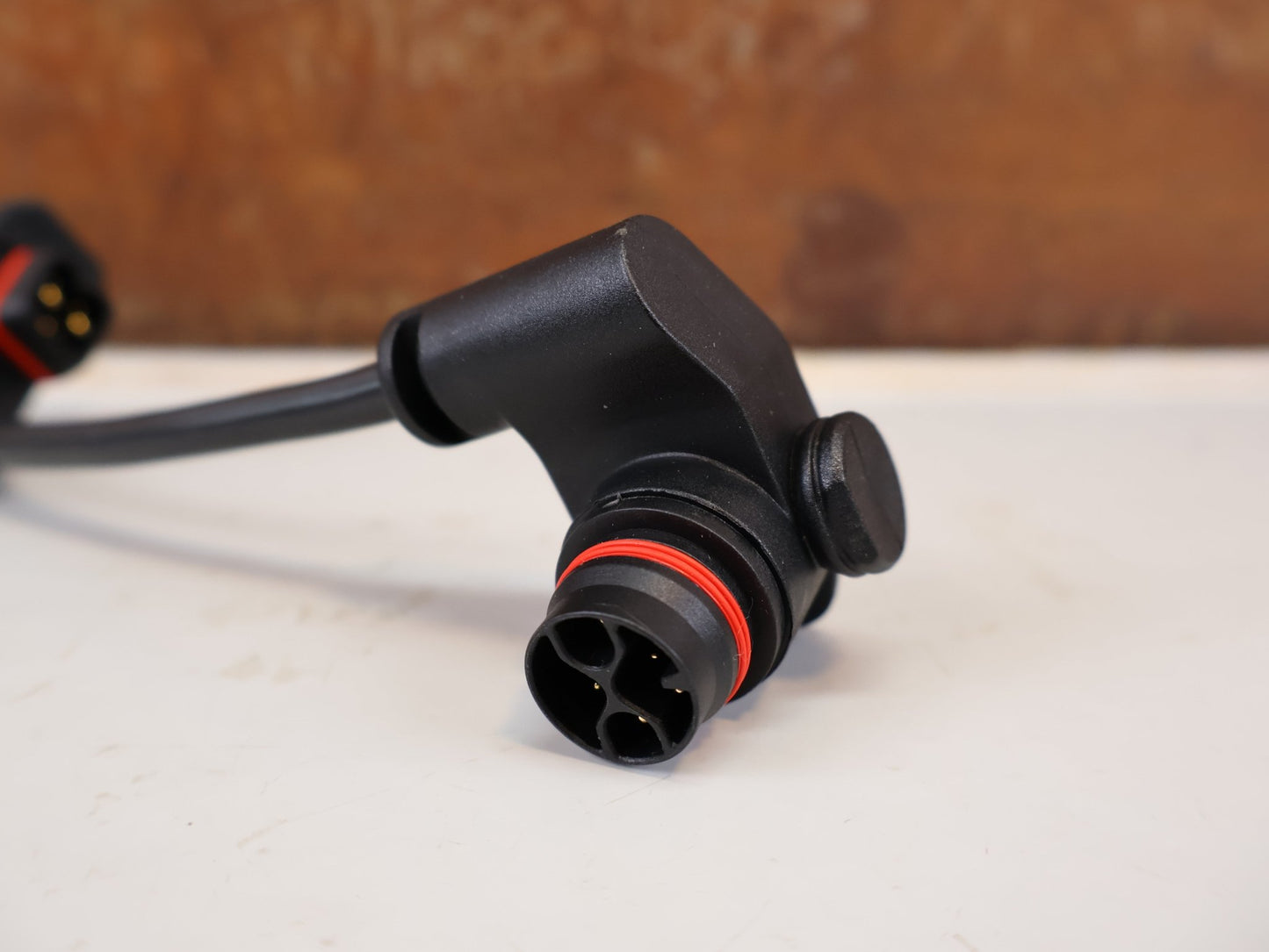 Batterie/Range Extender von TQ, TQ RANGE EXTENDER KABEL V01 / 85MM HPR50 E-BIKE VERBINDUNGSKABEL vor USEDBIKES-OB.DE Hintergrund