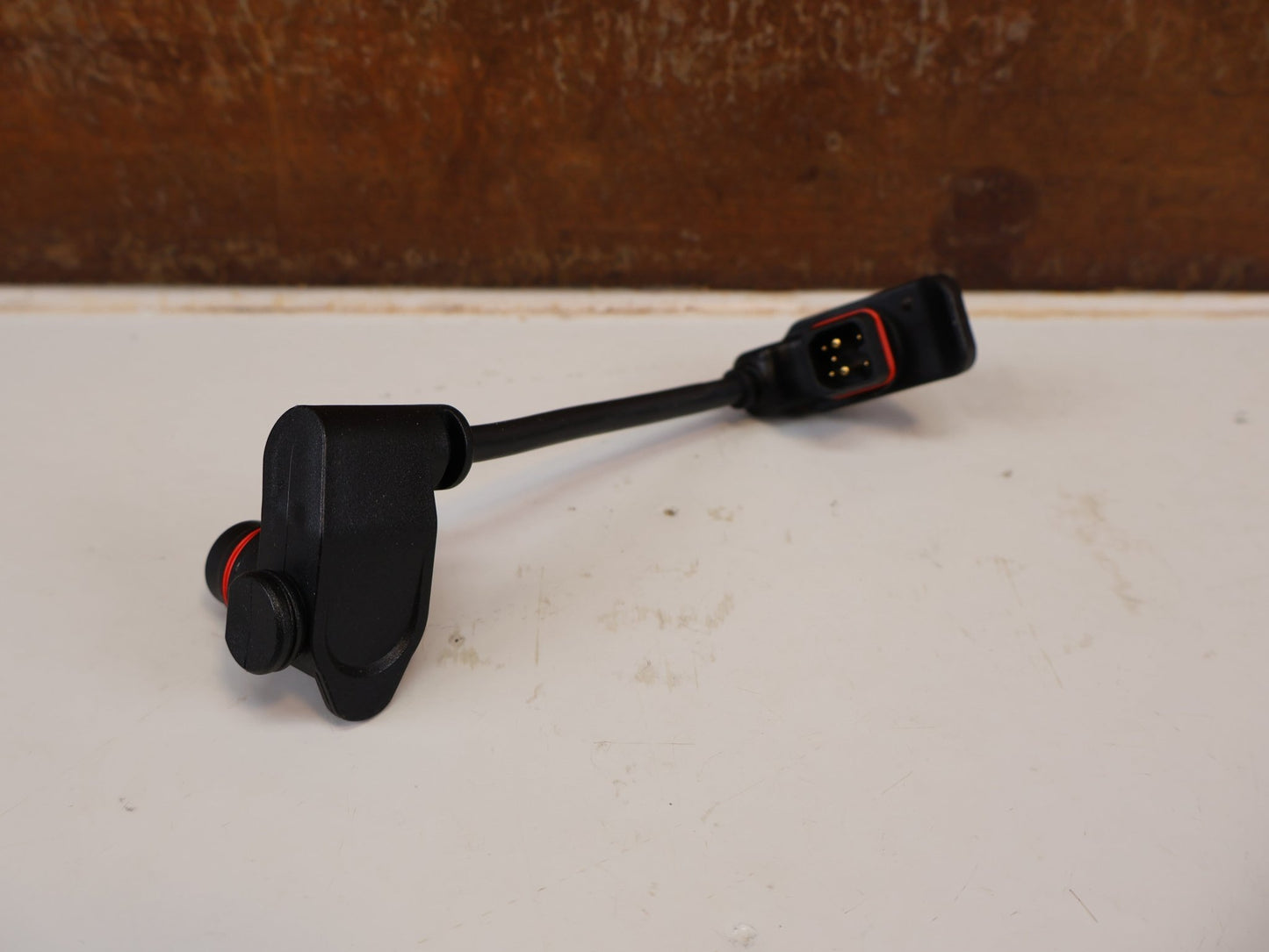 Batterie/Range Extender von TQ, TQ RANGE EXTENDER KABEL V01 / 85MM HPR50 E-BIKE VERBINDUNGSKABEL vor USEDBIKES-OB.DE Hintergrund