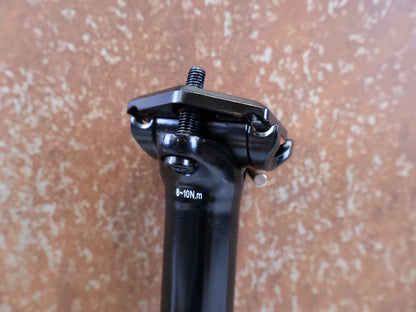 Sattelstütze von TranzX, TRANZX JD YSI34 VARIOSATTELSTÜTZE 34.9 MM 170 MM vor USEDBIKES-OB.DE Hintergrund